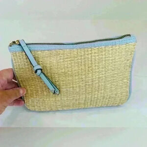 Light blue vegan leather and straw purse, with gold hardware. NWOT.